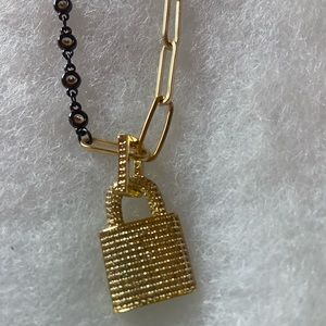 Gold plated and black necklace with gold plated lock and crystals .. nev…